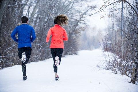 couple-running-in-the-winter-high-res-stock-photography-499507505-1536597096.jpg