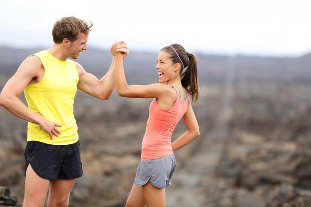 Young-fitness-couple-celebrating.jpg